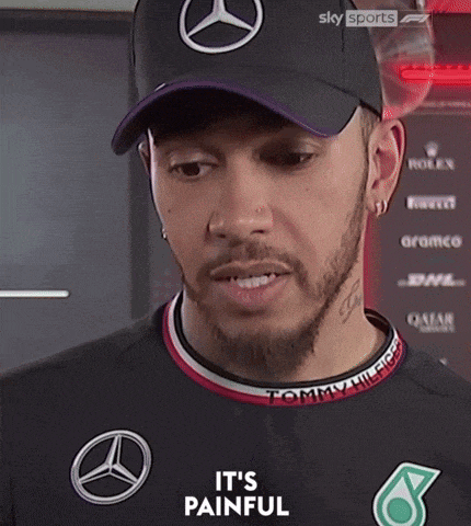 a man wearing a mercedes hat and a tommy hilfiger shirt says it 's painful