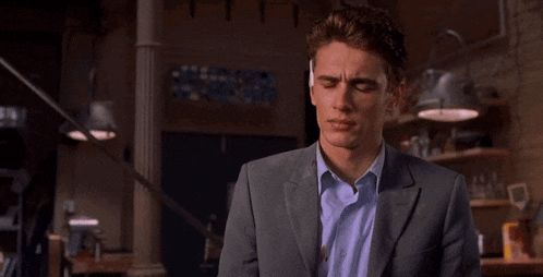 a man in a suit and a blue shirt says i 'm gonna get some rest