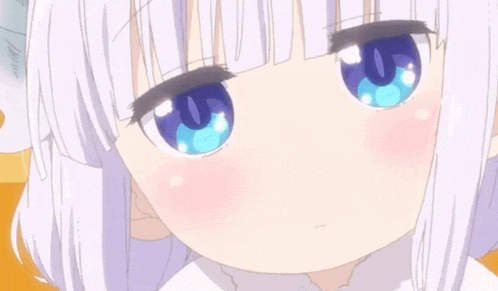a close up of a cute anime girl with blue eyes .