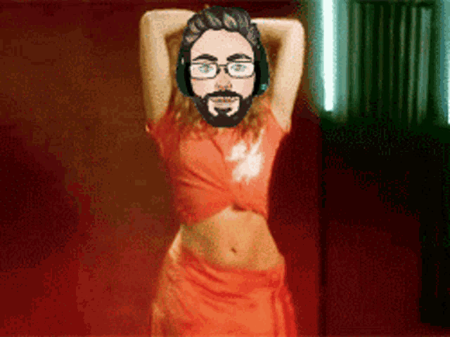 a man with glasses and a beard is standing in front of a woman in an orange dress