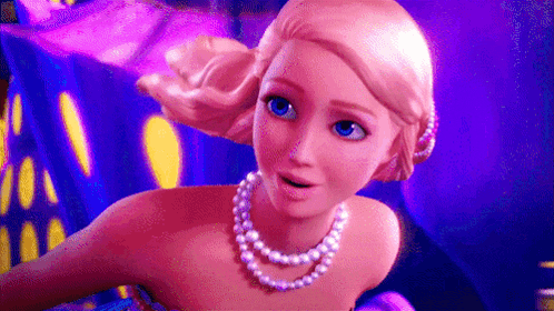 a barbie doll is wearing a pearl necklace and a pink dress