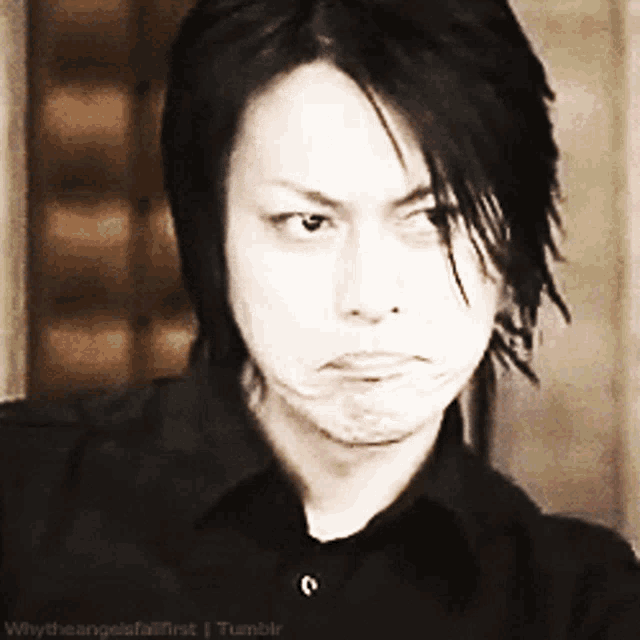 a close up of a man 's face with the words whytheangelsfallfirst tumblr written below him