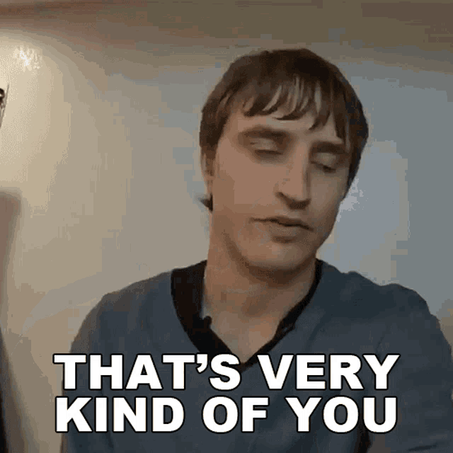 a man says " that 's very kind of you " in front of a white wall
