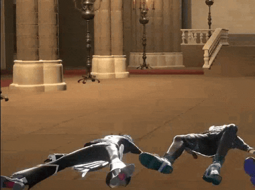 a couple of people laying on their backs in a hallway