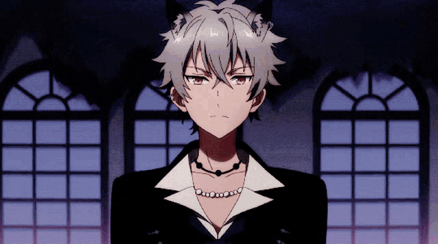 a boy with cat ears and a pearl necklace is standing in front of a window