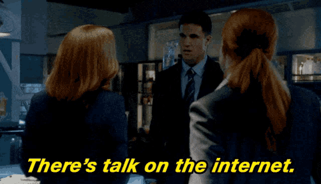 a man and two women talking with the words there 's talk on the internet in yellow letters