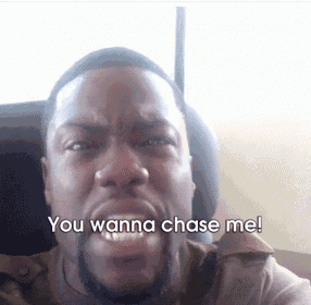 a man with a beard is crying with the words you wanna chase me