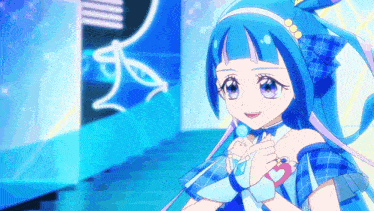 a girl with blue hair and a heart shaped necklace