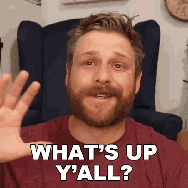 a man with a beard says what 's up y ' all