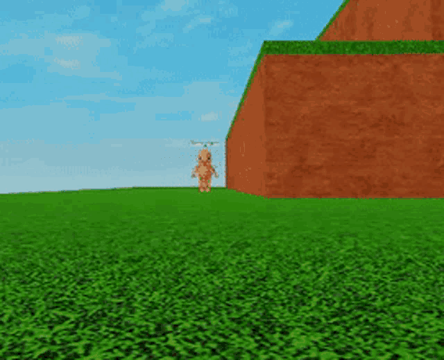 a cartoon character is standing in a field next to a brick wall .
