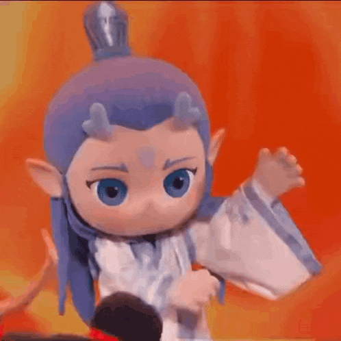 a stuffed toy of a cartoon character with blue hair and horns is holding a red scarf .