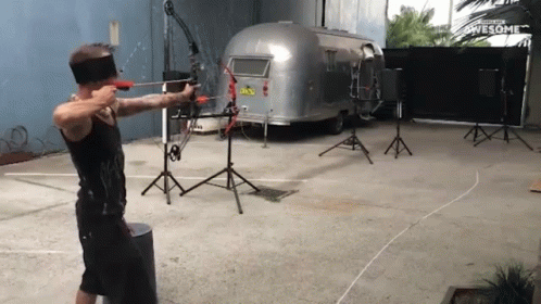 Blindfolded Shooting Target GIF - Blindfolded Shooting Target Without Looking GIFs
