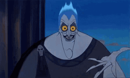 a close up of a cartoon character with glowing eyes and a skull on his chest .