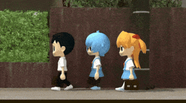 a boy and two girls walking down a sidewalk