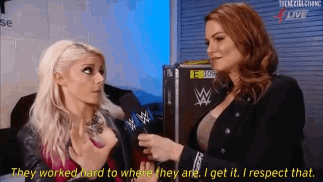 two women are talking to each other and one of them says they worked hard to get where they are