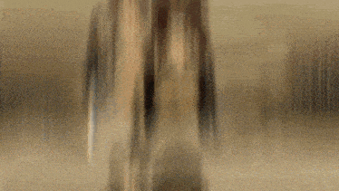 a blurred image of a person 's face with a few lines visible