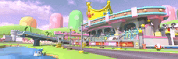 a colorful building with a crown on top of it is in a video game scene