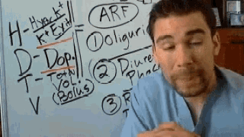 a man is sitting in front of a white board with the word arf on it