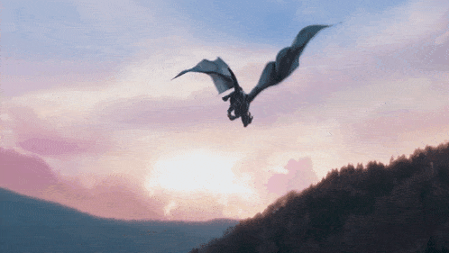 a dragon is flying in the sky over a hill