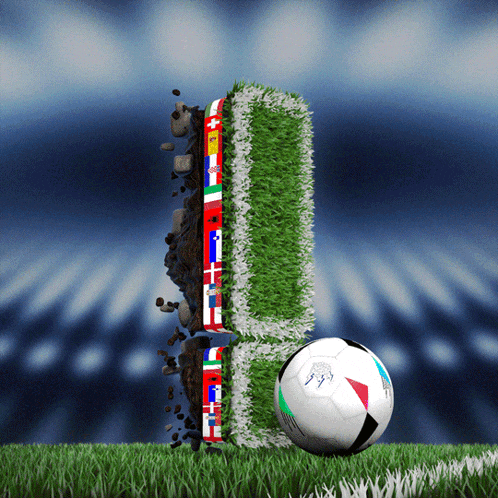 a soccer ball on a field with a letter l made out of grass