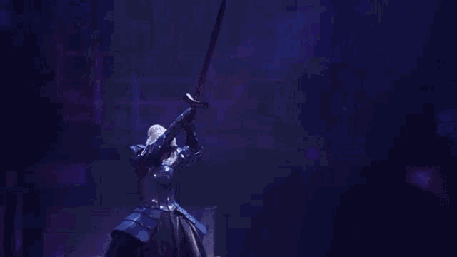 a woman in a knight 's armor is holding a sword in a dark room .