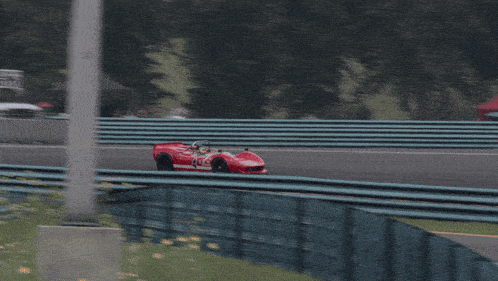 a red sports car with the number 4 on it