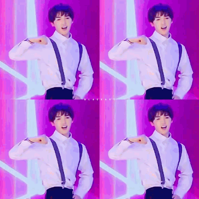 a young man wearing suspenders and a white shirt is standing in front of a purple background