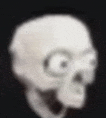 a blurry picture of a skull on a black background
