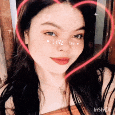 a woman with a heart around her face and the words love you on her face