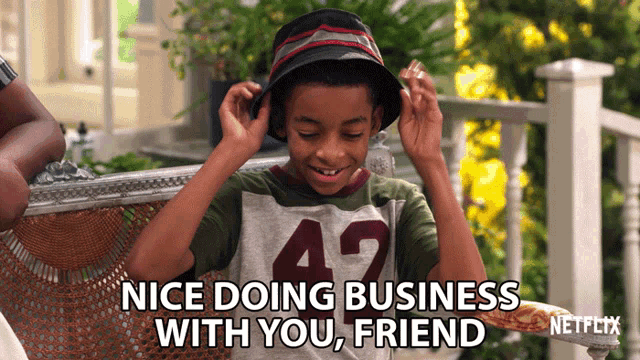 a boy wearing a hat with the words nice doing business with you friend above him