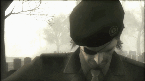 a man wearing a black beret with a skull and crossbones on it
