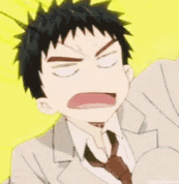 a man in a suit and tie is making an angry face