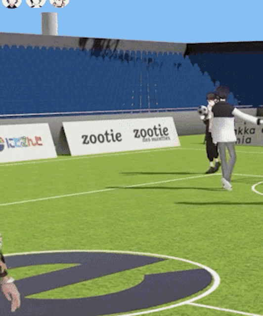 a soccer field with a zootie banner on the side