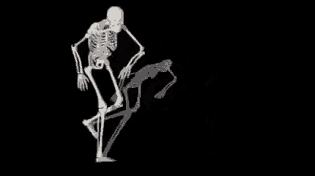 a skeleton is dancing on a black background with its shadow on the ground .