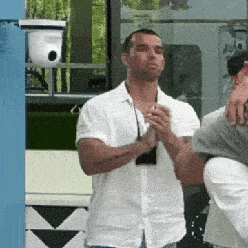 a man in a white shirt has a tattoo on his arm that says ' i love you ' on it