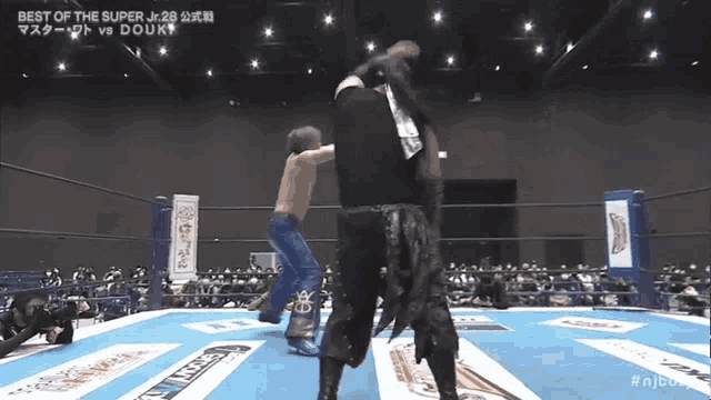a wrestling match between douk and best of the super jr.28