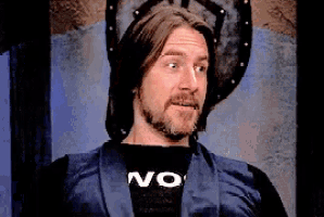a man wearing a black shirt that says no