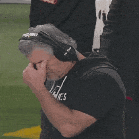 a man wearing headphones is wearing a shirt that says utes