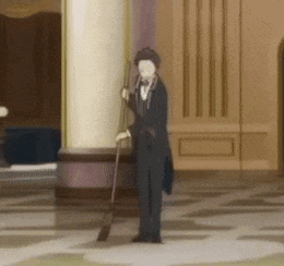 a man in a tuxedo is sweeping the floor