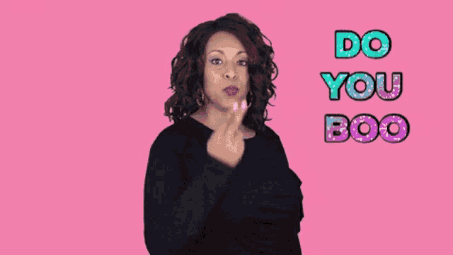 a woman is making a funny face with the words do you boo above her
