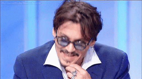 Johnny Depp Smile GIF - Johnny Depp Smile Fix Hair GIFs