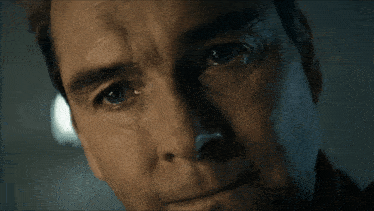 a close up of a man 's blue eyes