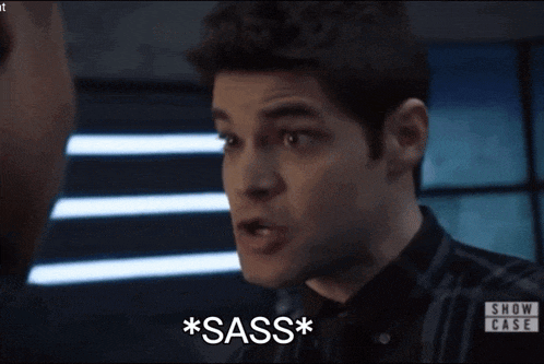 a close up of a man 's face with the words * sass * on the bottom
