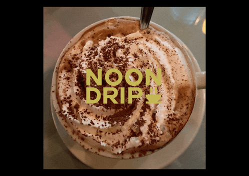 a cup of coffee with whipped cream and the words noon drip on the bottom