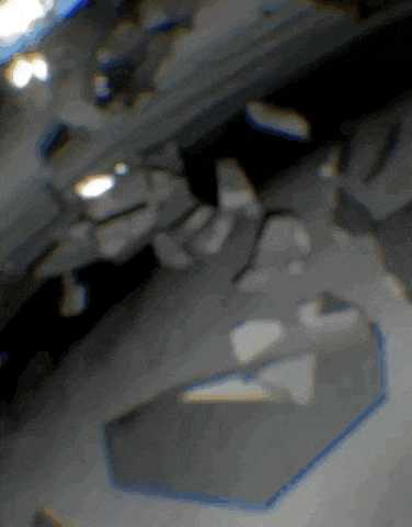 a blurred image of a person 's hand with a blue outline