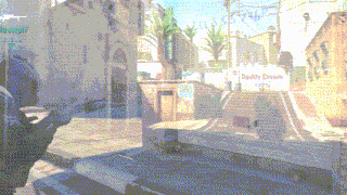 a blurred image of a street with a sign that says baddy dream