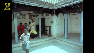 a group of people are gathered in a room with a sp logo on the top left