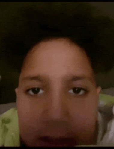 a close up of a person 's face with their eyes closed