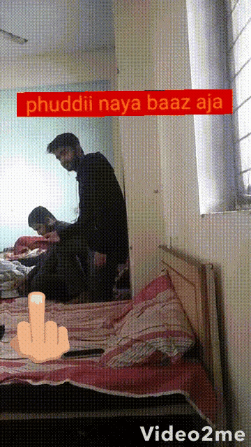 a video of a man giving another man a massage with the words phuddii naya baaz aja behind him