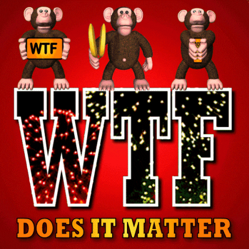 three monkeys are holding a sign that says wtf